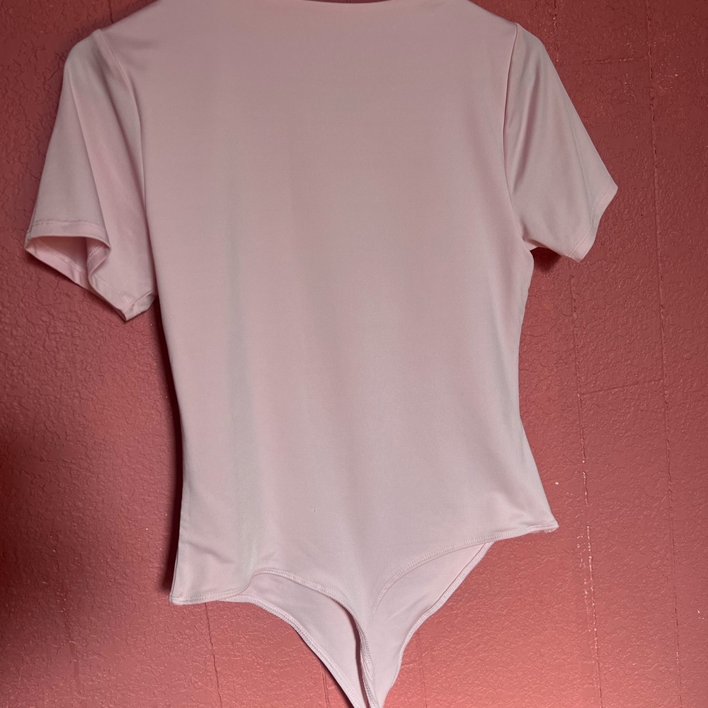 baby pink bodysuit